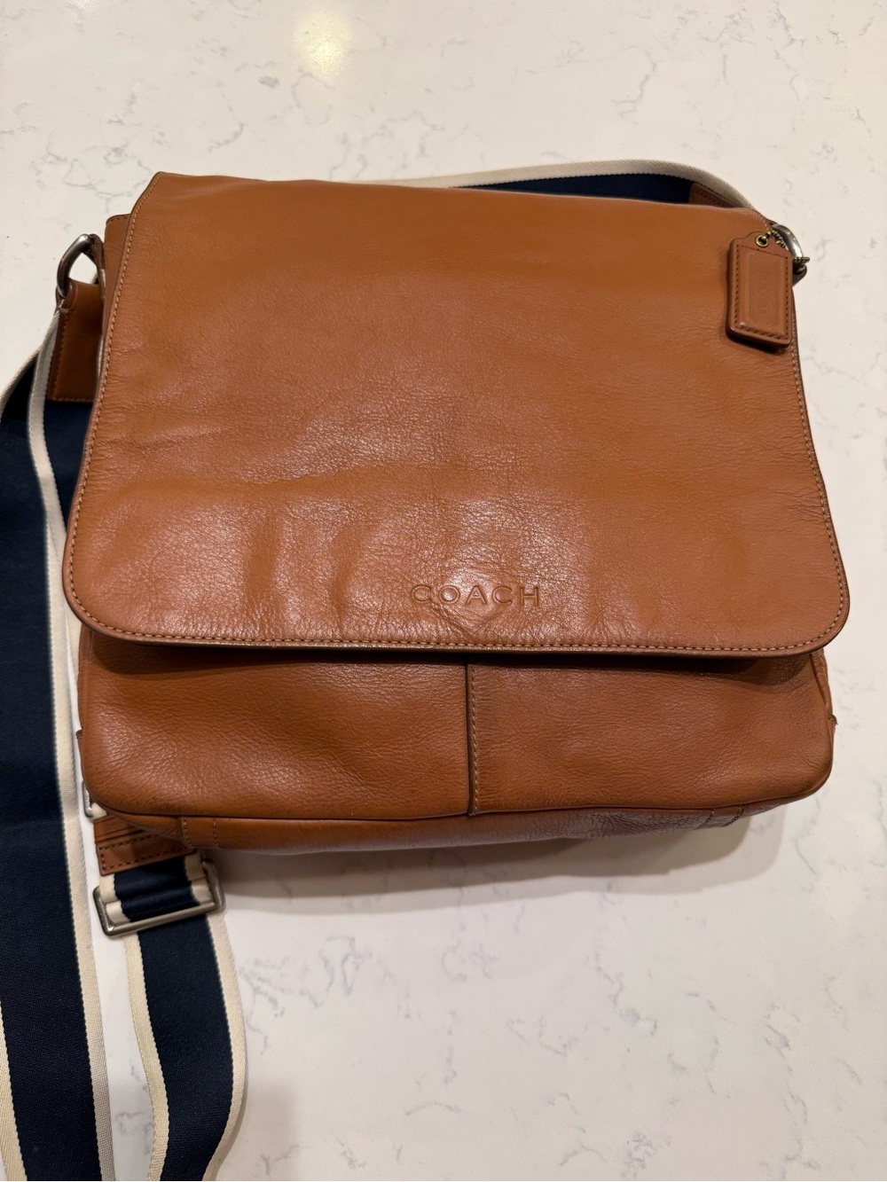 Coach Men’s Cognac Leather Messenger Bag with Striped Strap
